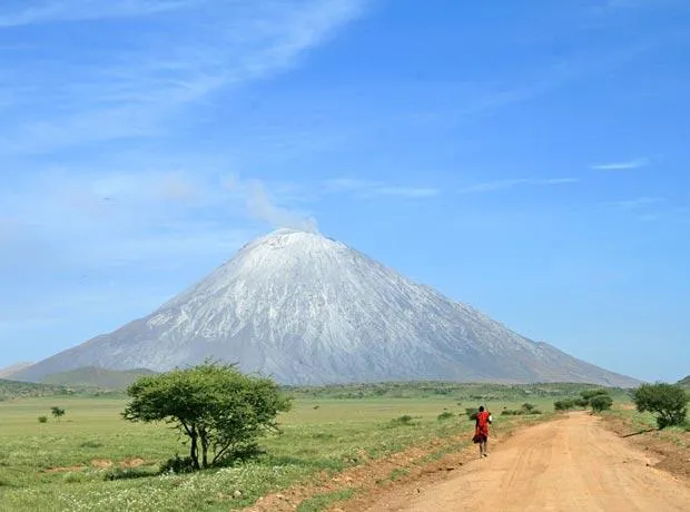 The cone of Ol Doinyo Lengai above the plains near Lake Natron