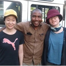Emily Baridi, driver guide, with two guests